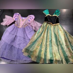 TWO DISNEY GIRLS COSTUMES RAPUNZEL AND ANNA FROM FROZEN SIZE 9/10